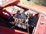 I wish I had the engine bay picture when I just purchased the car. Rat's nest had to be swept away to see the top of the valve cover!